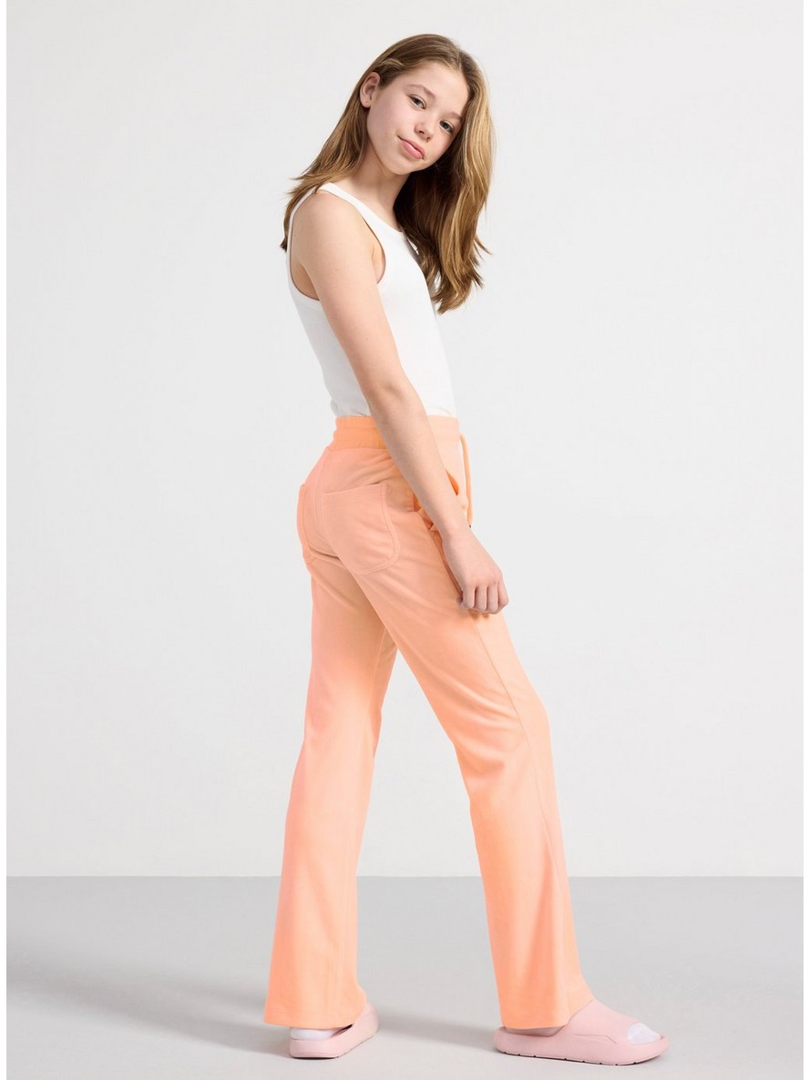 Flared velour trousers