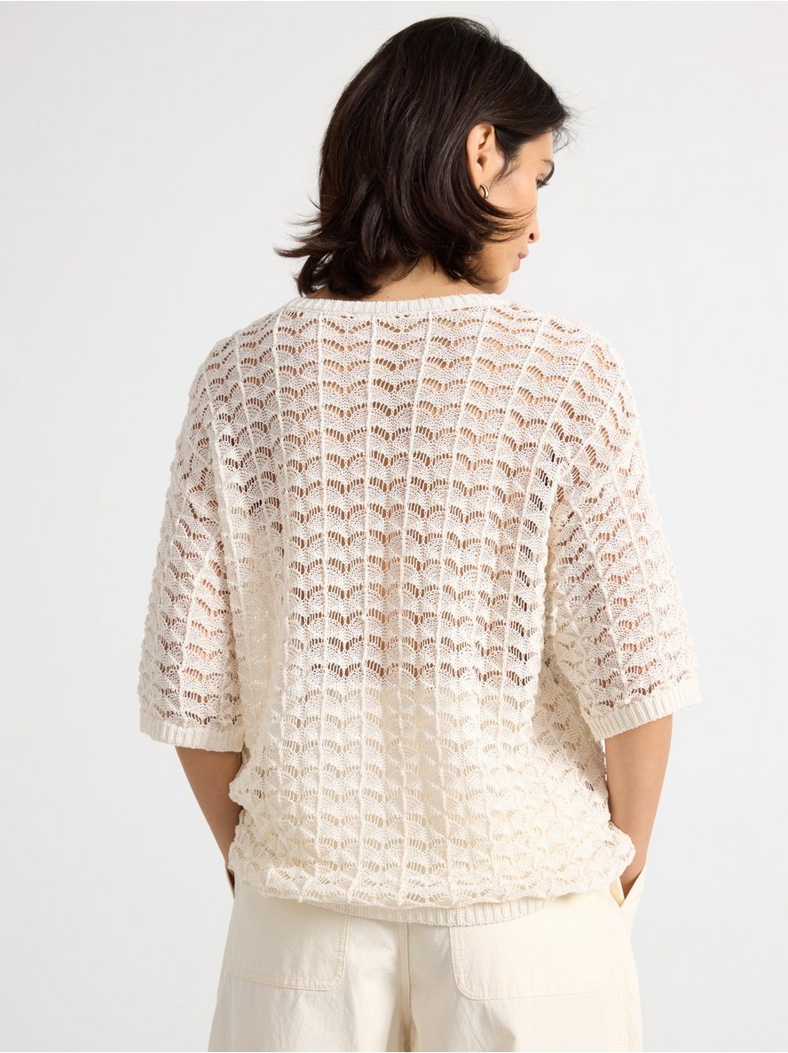 Hole-knit jumper
