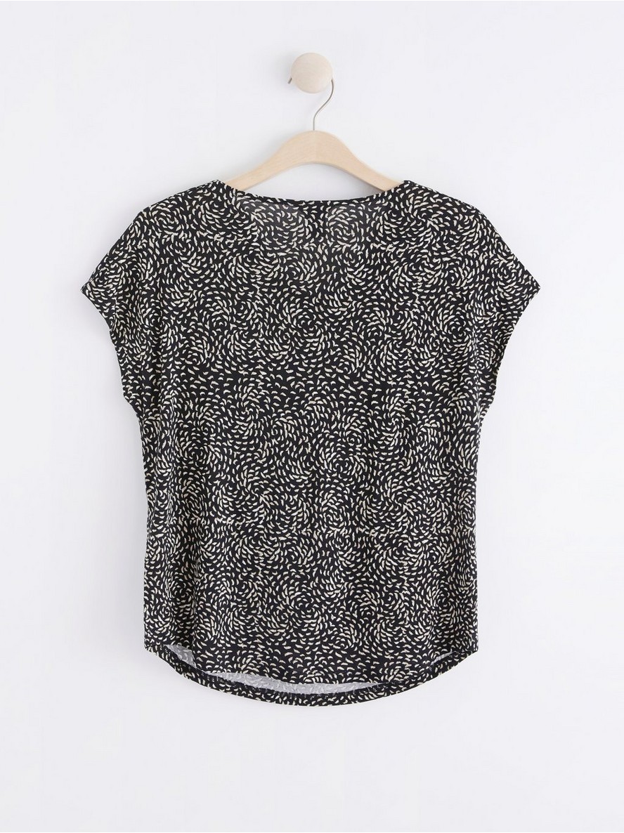 Short sleeve top with draped neckline