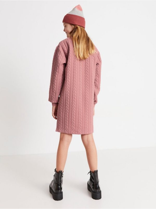 Dress with cable knit design