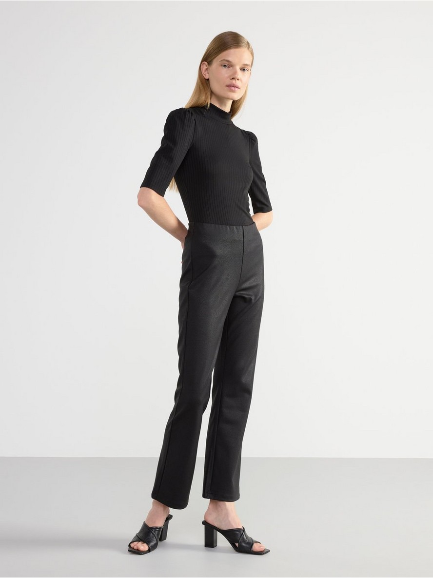 Coated jersey trousers