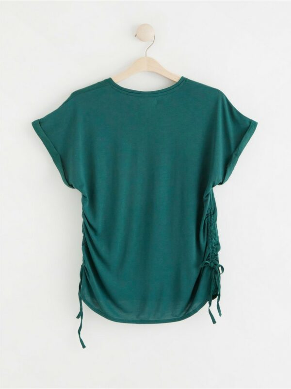 Short sleeve top with drawstrings