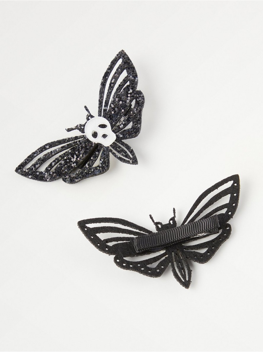 2-pack butterfly hair clips with glitter and skulls