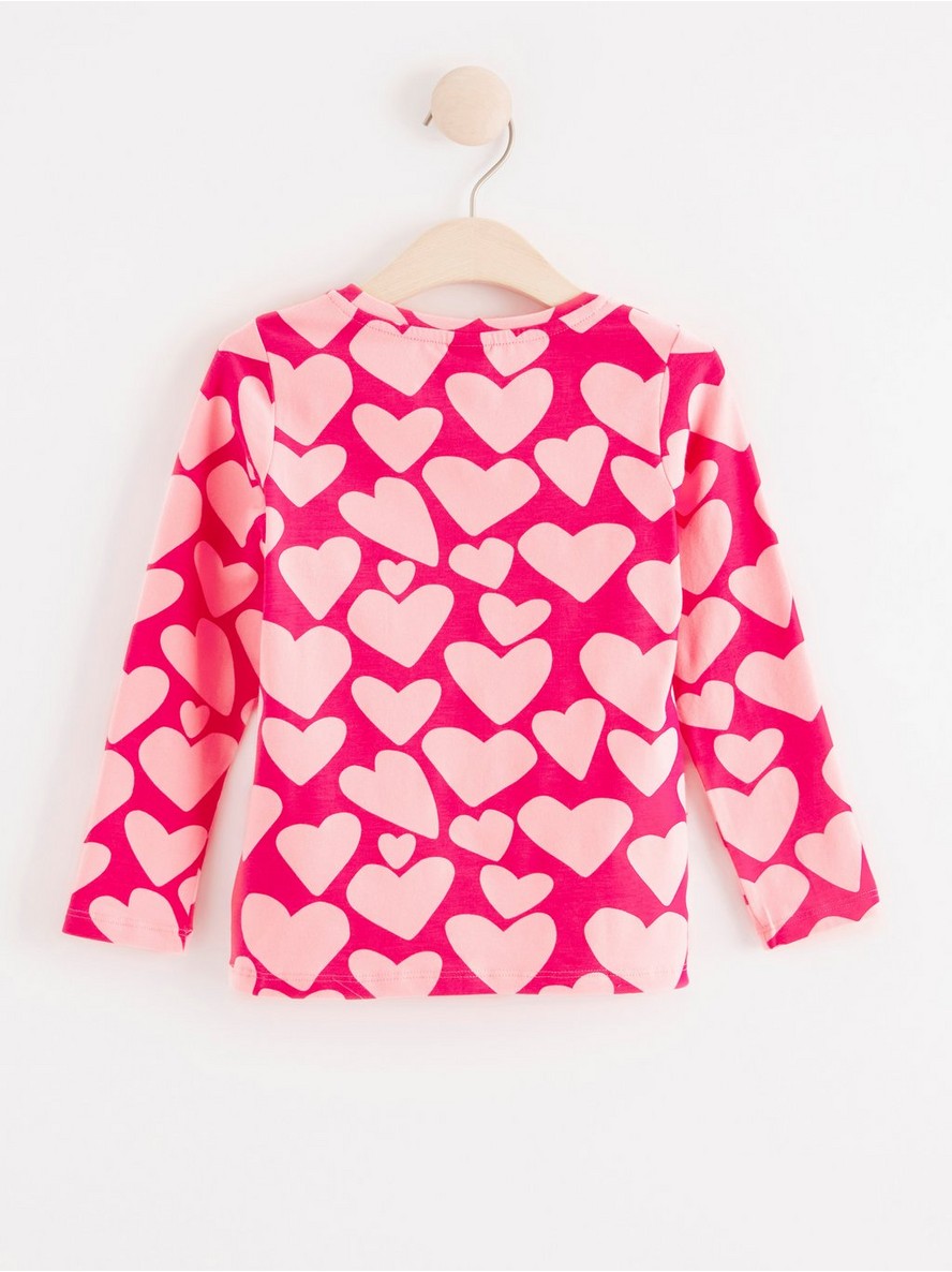 Long sleeve top with hearts