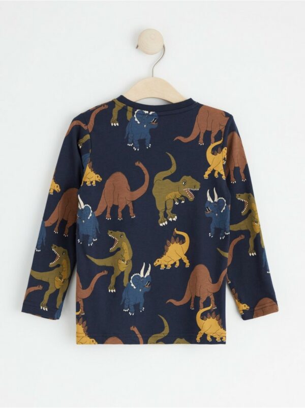 Long sleeve top with dinosaurs