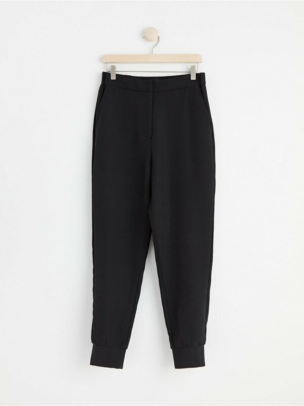 Tapered trousers - Black, XL