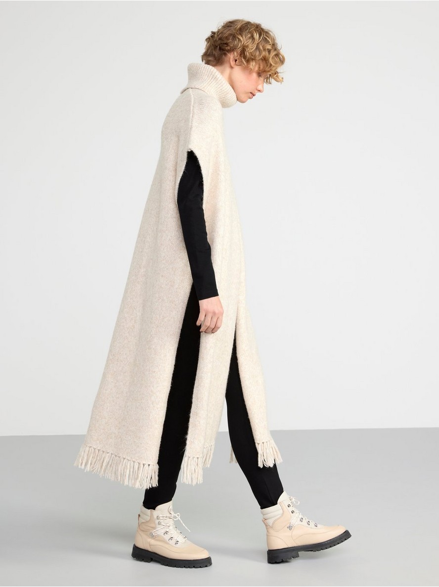 Knitted roll neck poncho