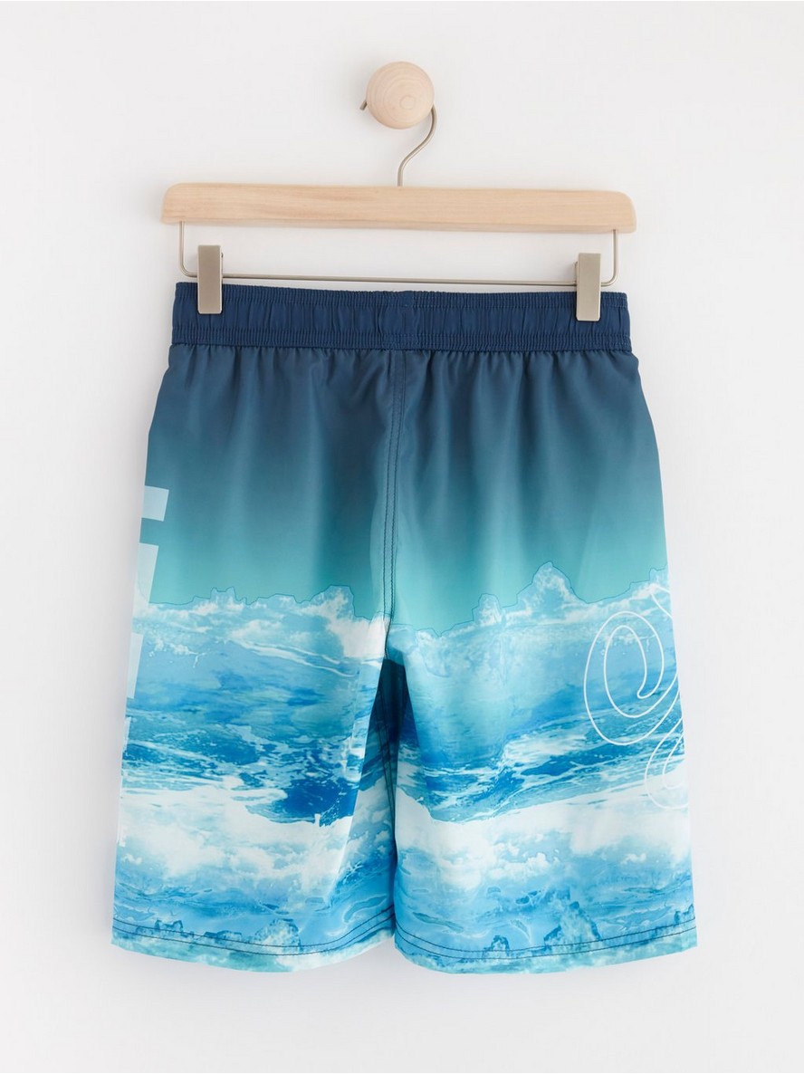 Swim shorts with surf pattern