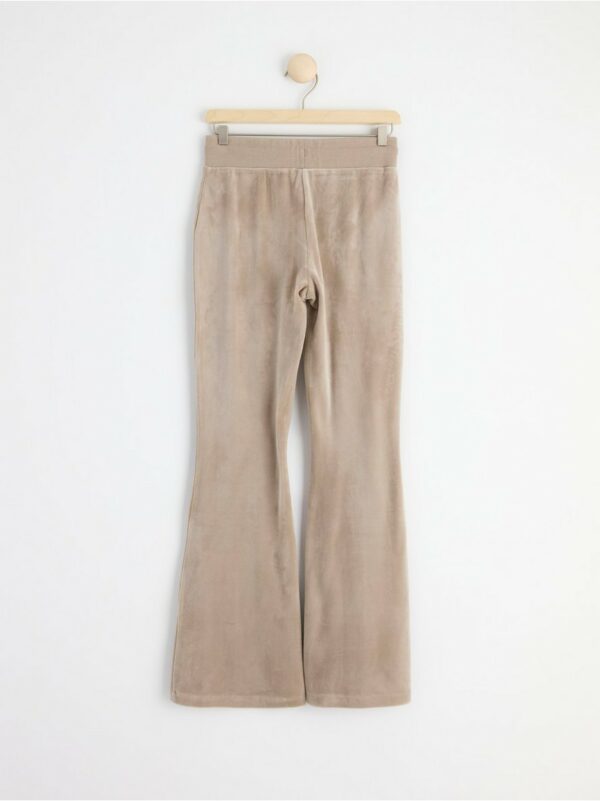 Flared velour trousers