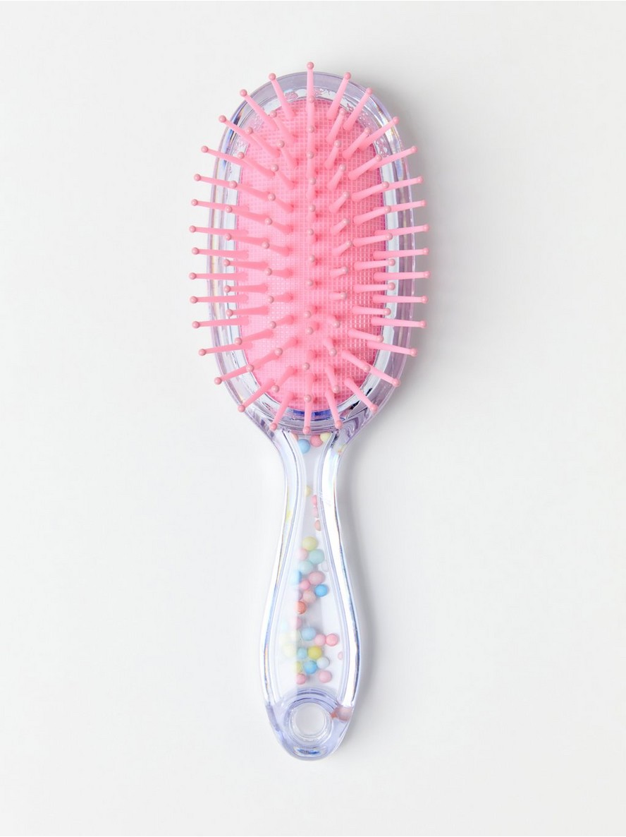Hairbrush with unicorns and candy