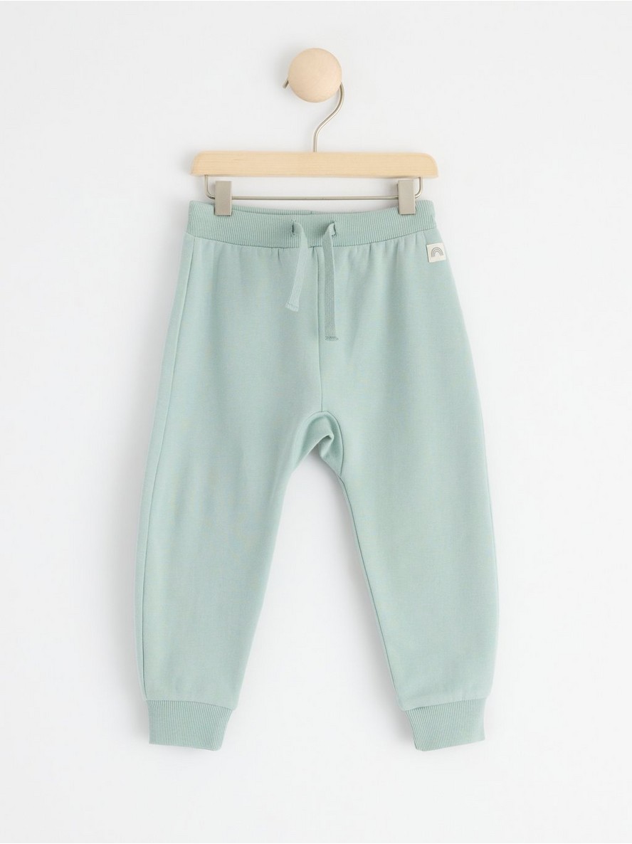 Sweatpants with brushed inside and back appliqué