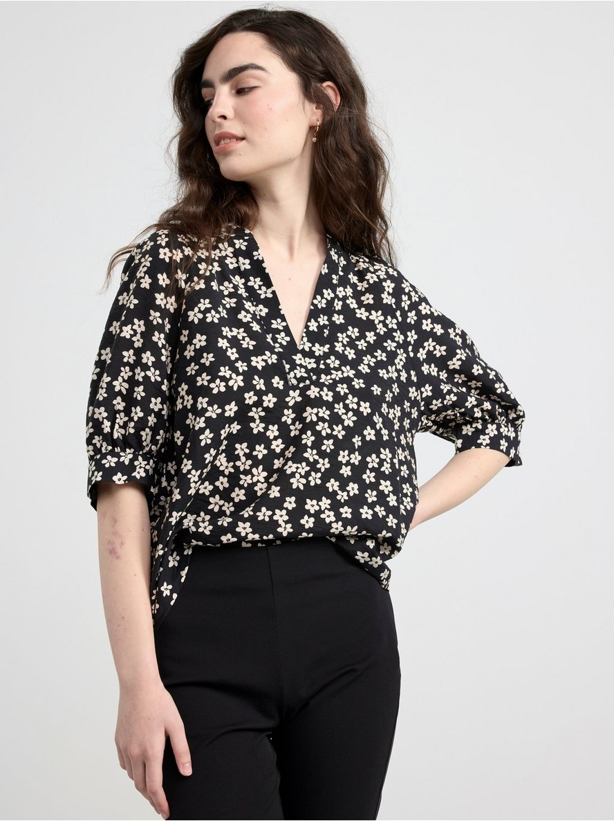 Patterned short sleeve blouse with v-neck