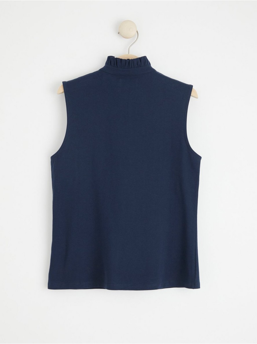 Sleeveless top with frill collar