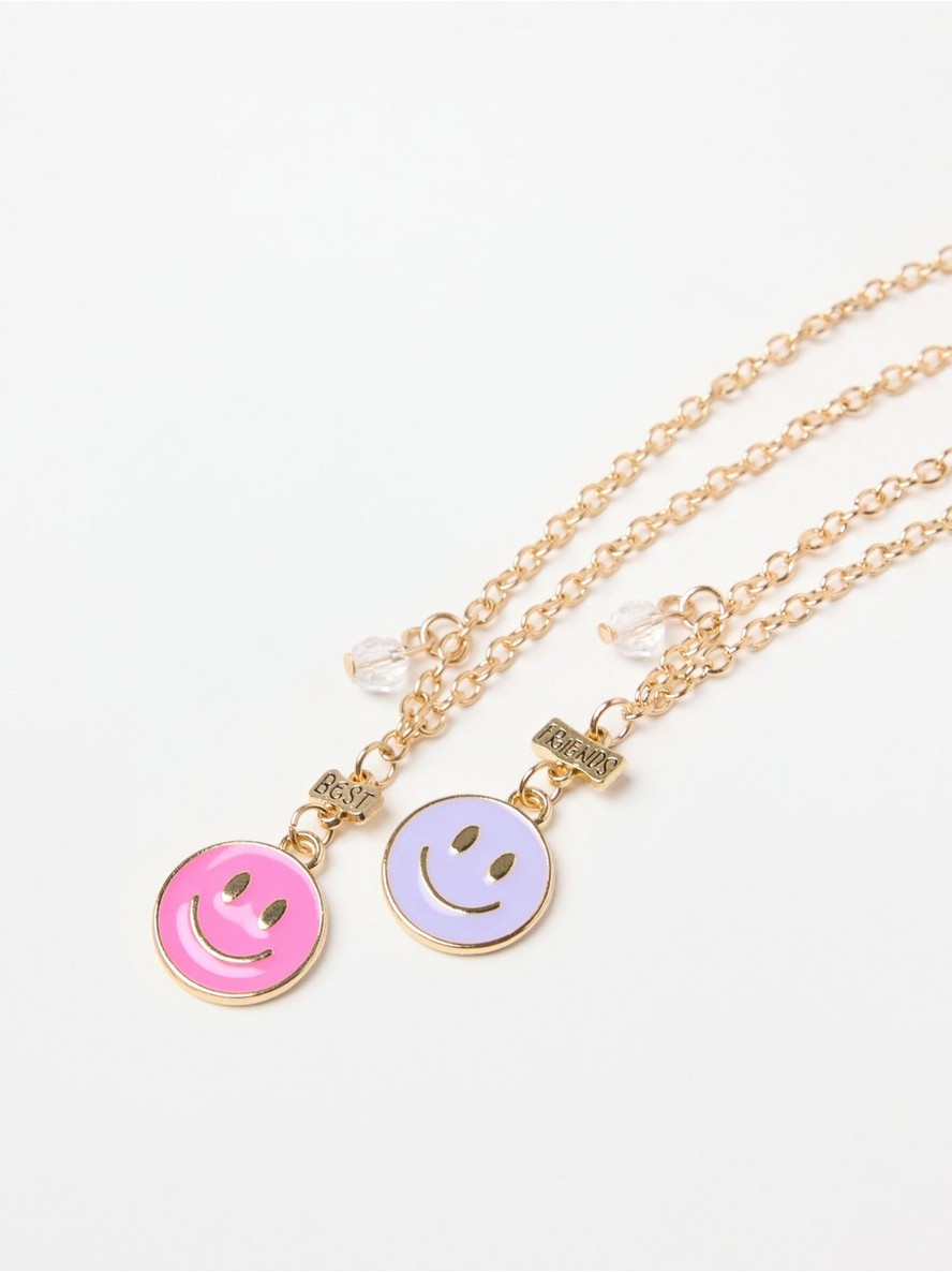 Best friend necklace with smiling faces