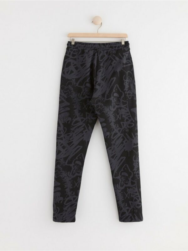 Trousers with allover print