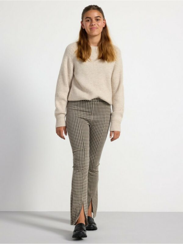 Flared trousers with checks
